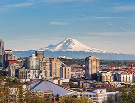 Seattle skyline with the Space Needle and Mount Rainier in the distance