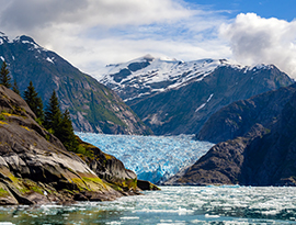 Snow-capped mountains and glacier scenery during an Alaska National Parks cruise excursion